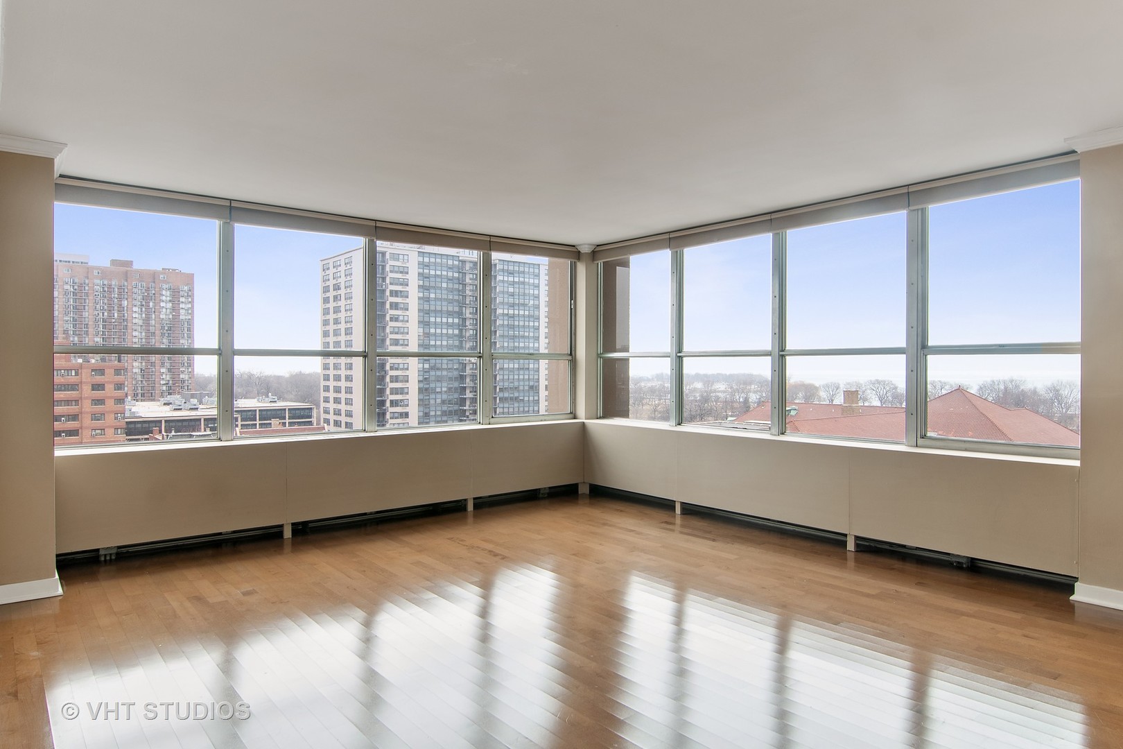 655 West Irving Park Road, Unit 910 Chicago, IL 60613 - Photo 4 of 14 a view of an empty room with a window