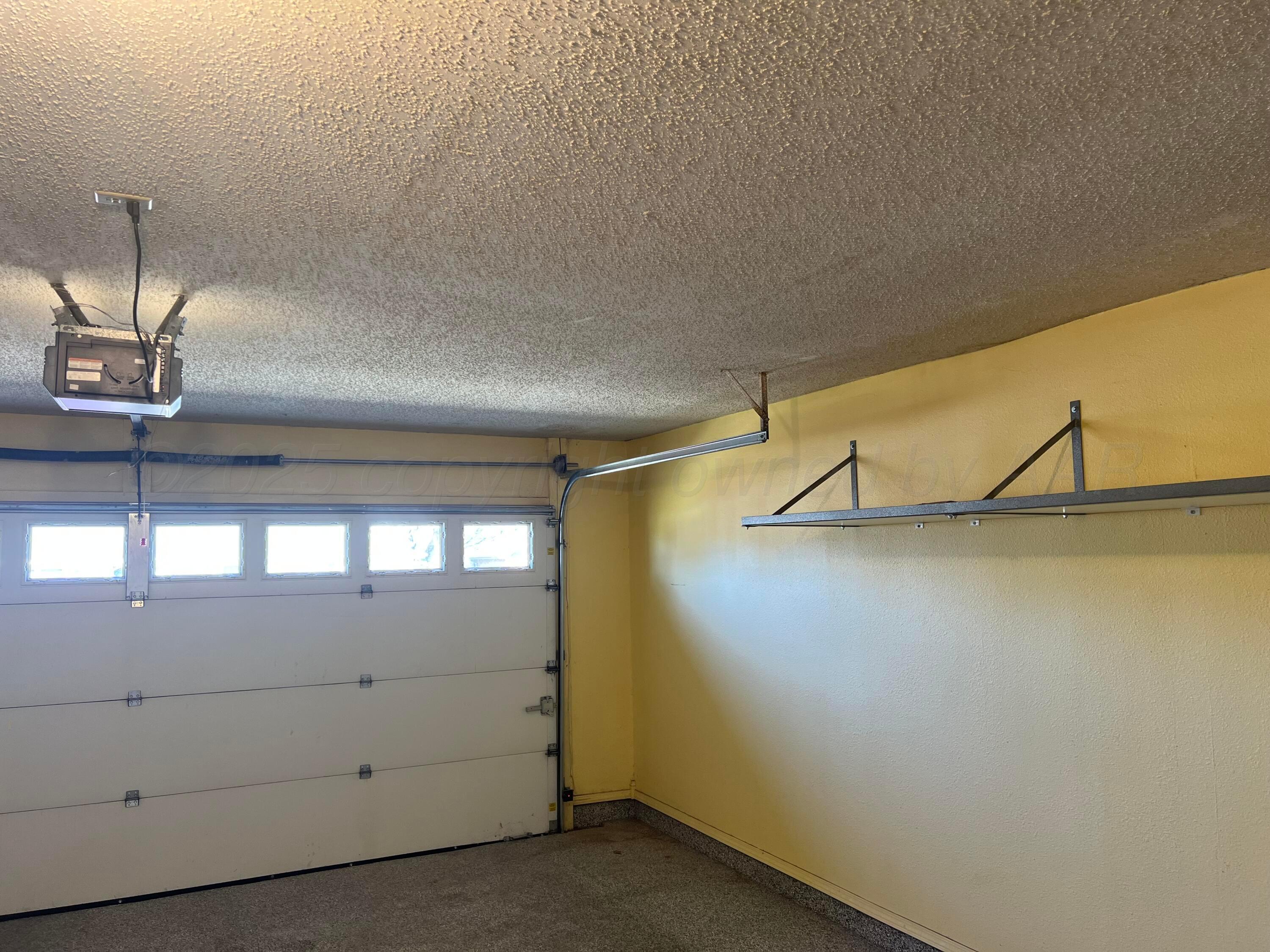 7115 Gainsborough Road Amarillo, TX 79106 - Photo 29 of 81 a view of a garage