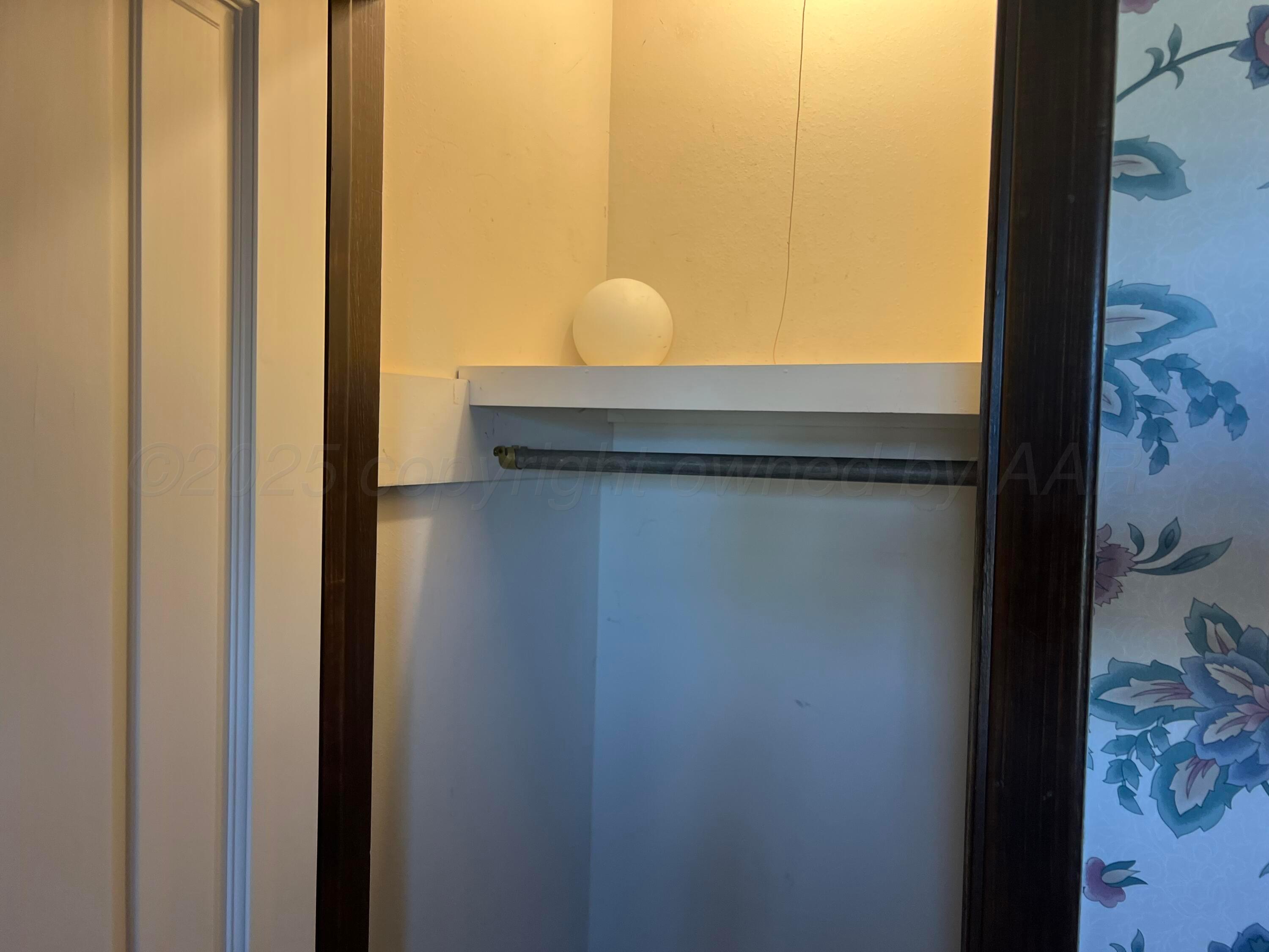 7115 Gainsborough Road Amarillo, TX 79106 - Photo 32 of 81 a bathroom with a sink and a mirror