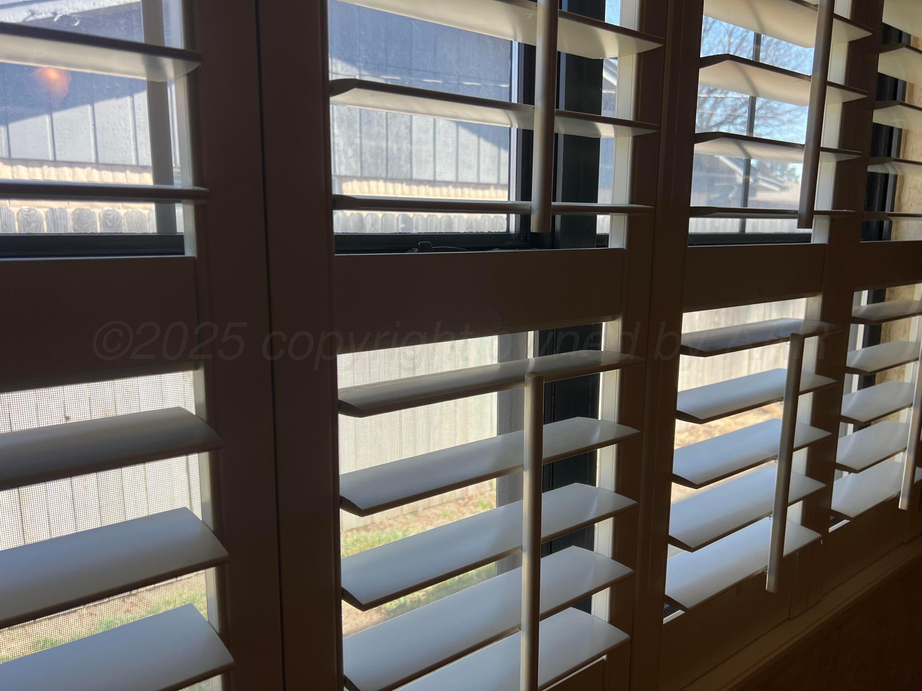 7115 Gainsborough Road Amarillo, TX 79106 - Photo 44 of 81 a view of staircase with a window