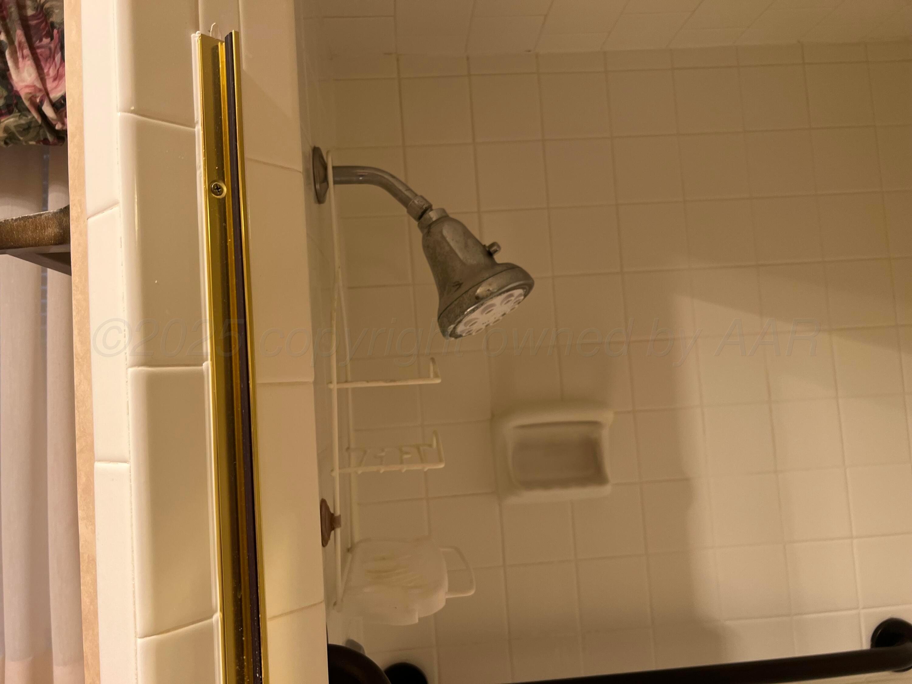 7115 Gainsborough Road Amarillo, TX 79106 - Photo 62 of 81 a bathroom with a shower