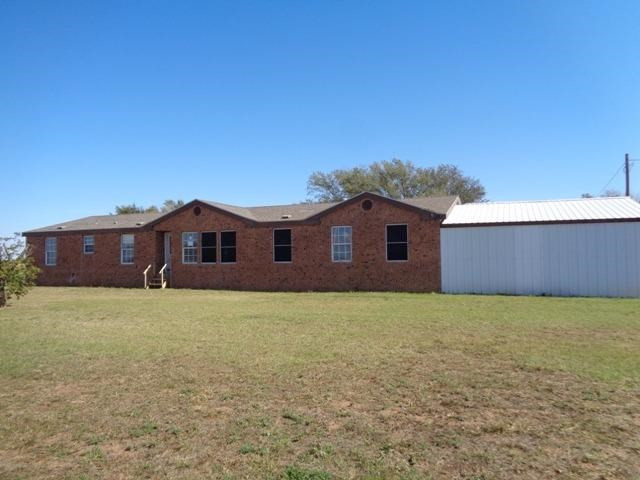 1723 Owl Road Lubbock, TX 79407 - Photo 1 of 18 a house view with a outdoor space