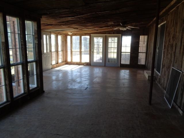 1723 Owl Road Lubbock, TX 79407 - Photo 14 of 18 a view of gallery with wooden floor