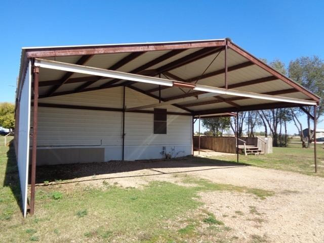 1723 Owl Road Lubbock, TX 79407 - Photo 17 of 18 a view of a house with backyard of house
