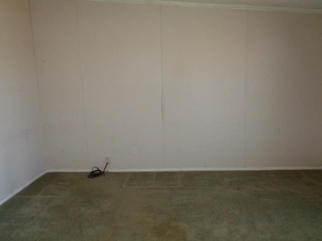 1723 Owl Road Lubbock, TX 79407 - Photo 8 of 18 a view of an empty room