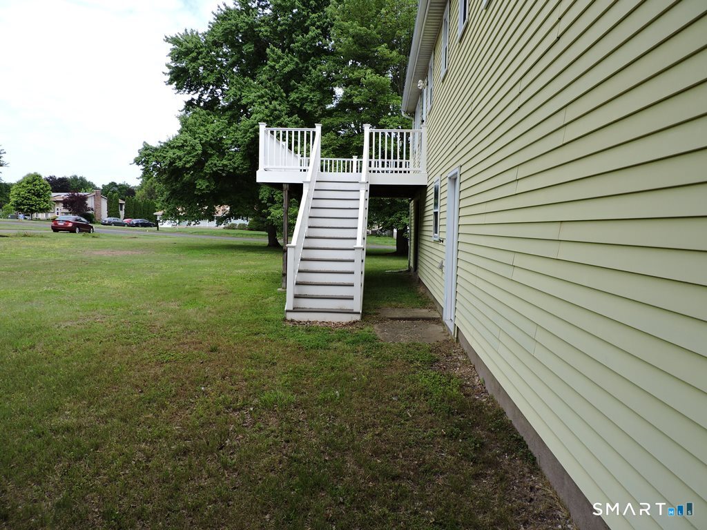 269 Griffin Road South Windsor, CT 06074 - Photo 31 of 36 a view of a house with a yard