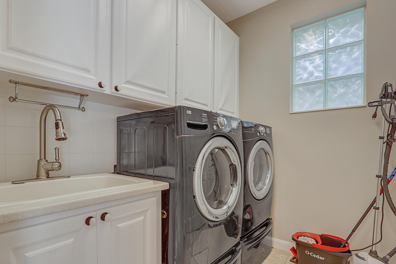 101 St Pierre Way Jupiter, FL 33458 - Photo 11 of 57 a utility room with dryer and washer