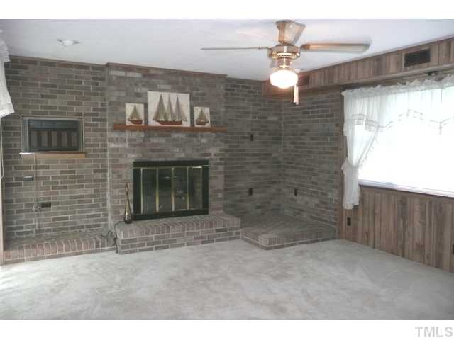 289 Chambers Loop Road Timberlake, NC 27583 - Photo 12 of 20 a room with fireplace