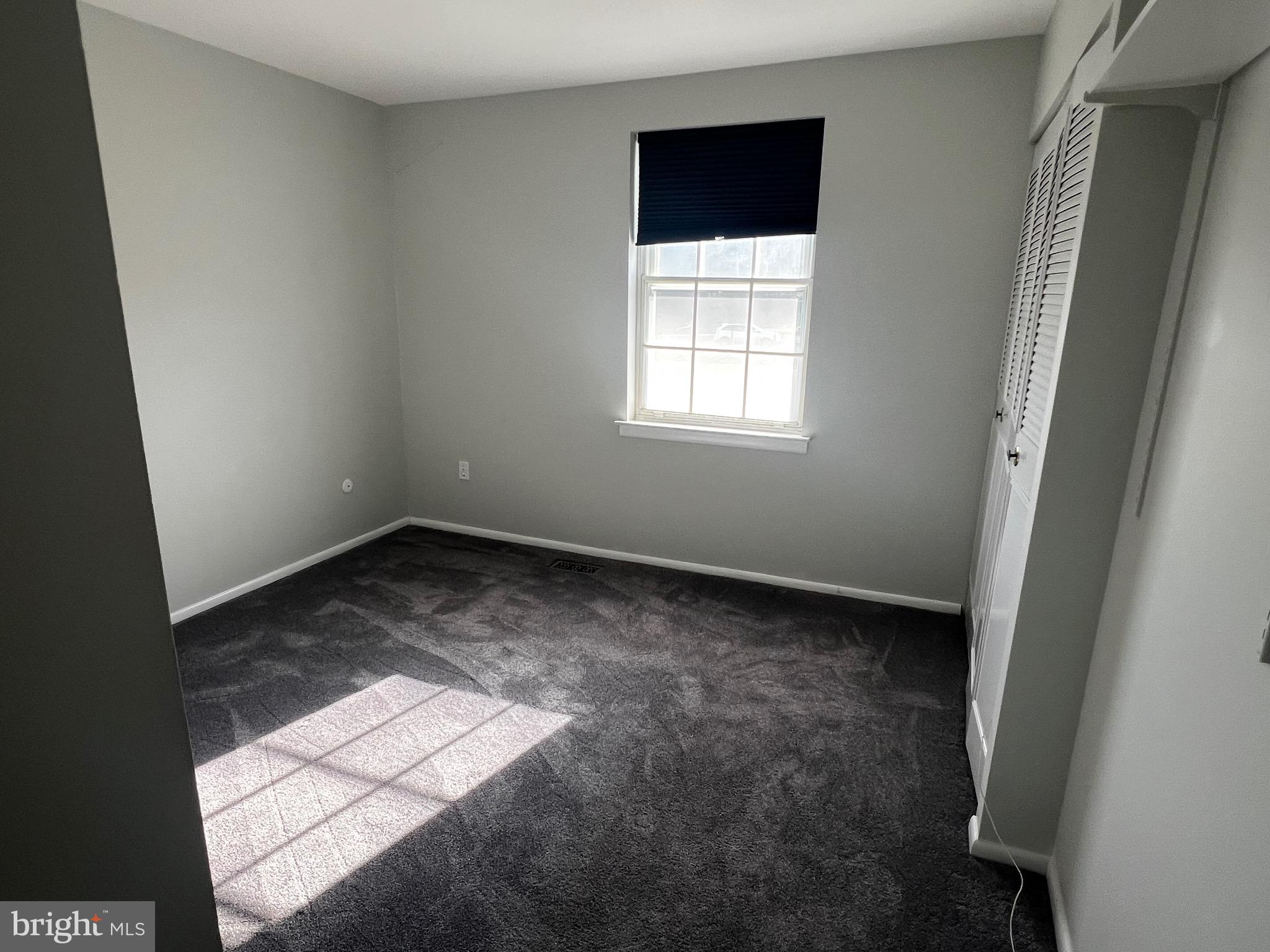 1756 Hybrid Place Clementon, NJ 08021 - Photo 8 of 13 an empty room with a window