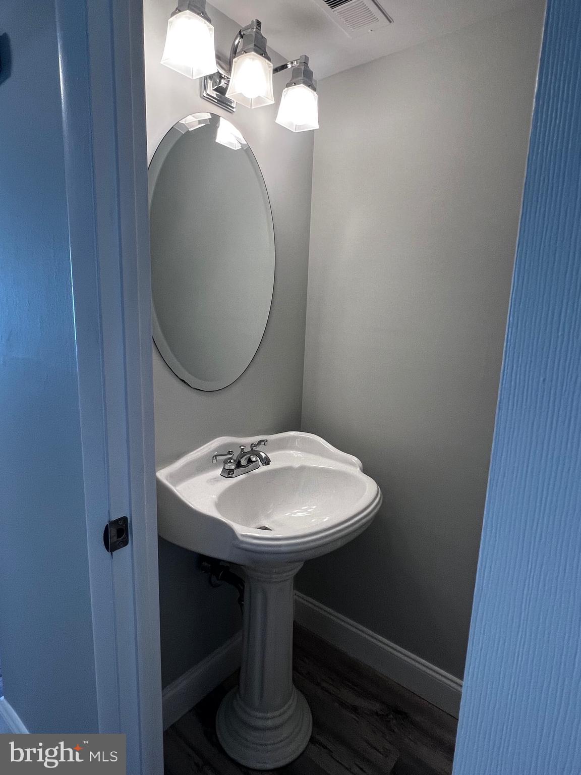 1756 Hybrid Place Clementon, NJ 08021 - Photo 9 of 13 a bathroom with a sink toilet and mirror