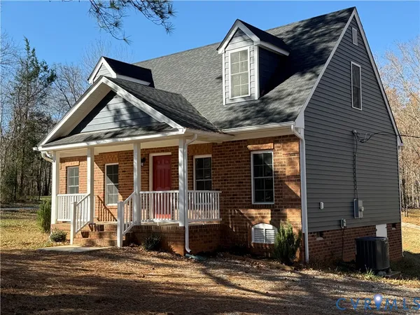 a front view of a house with a porch