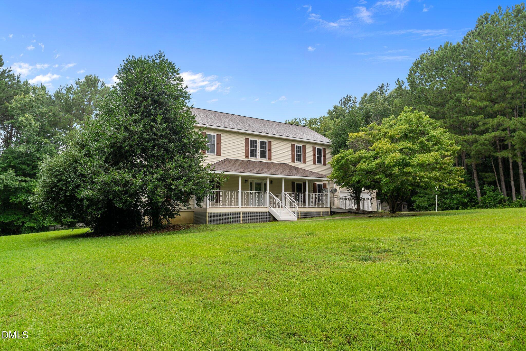 431 Patterson Ridge Lane Sanford, NC 27330 - Photo 2 of 29 a view of a house with a yard and sitting area
