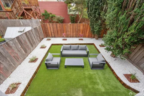 a view of swimming pool with a backyard