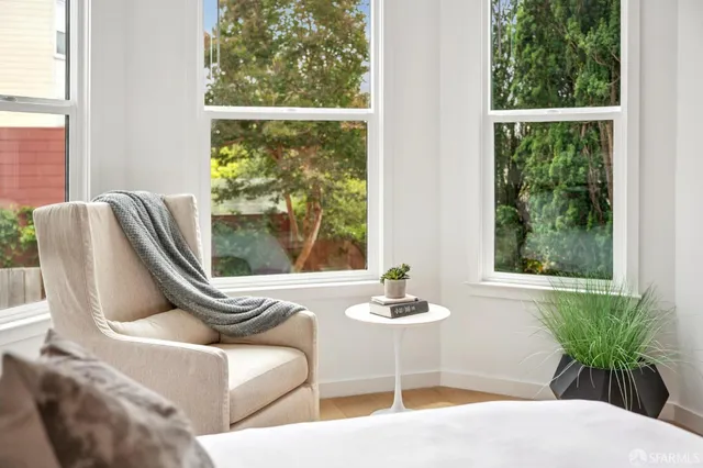 a living room with furniture and window