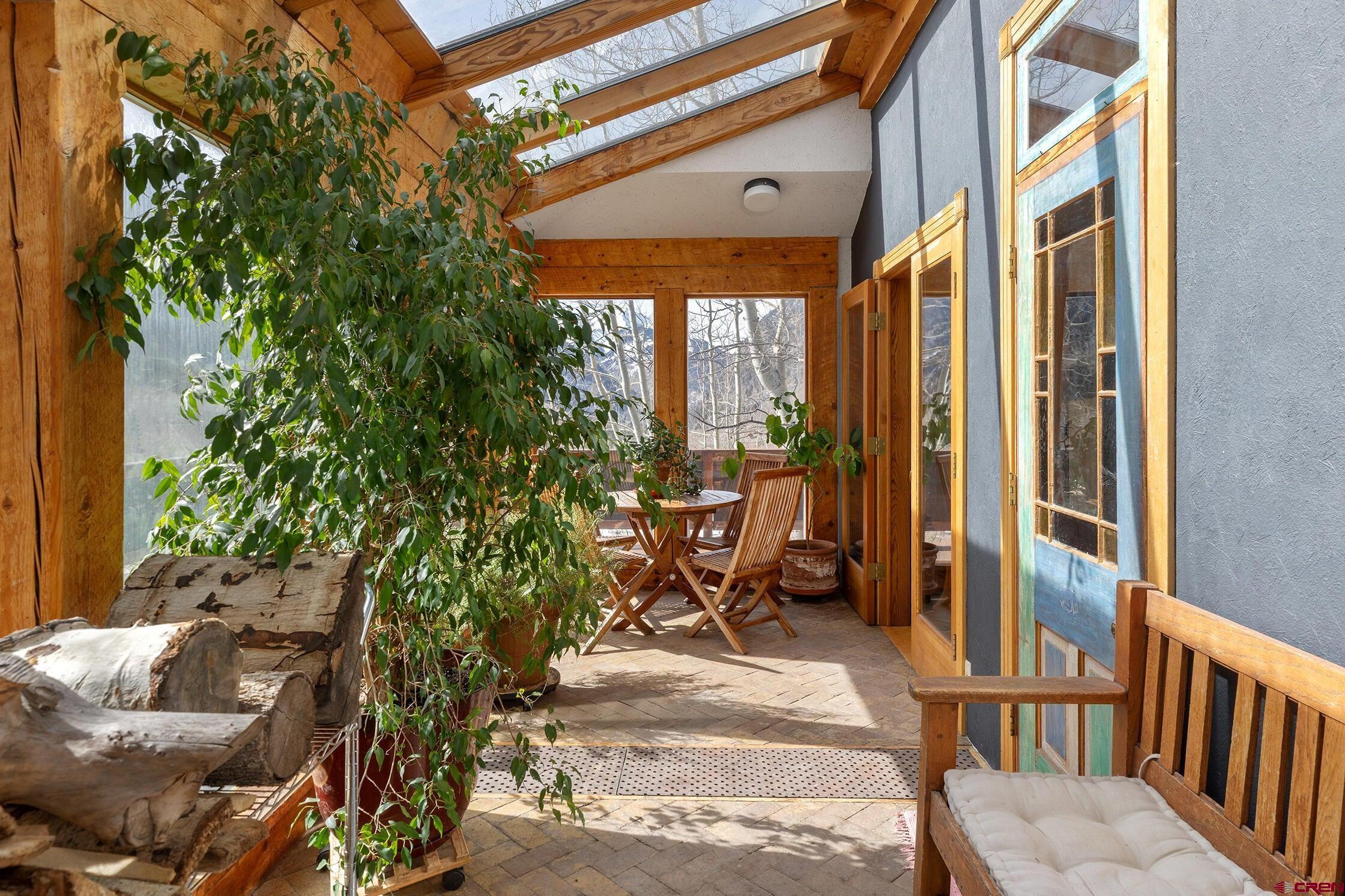 35 Porphyry Street Ophir, CO 81426 - Photo 31 of 40 a view of a porch with chairs and backyard