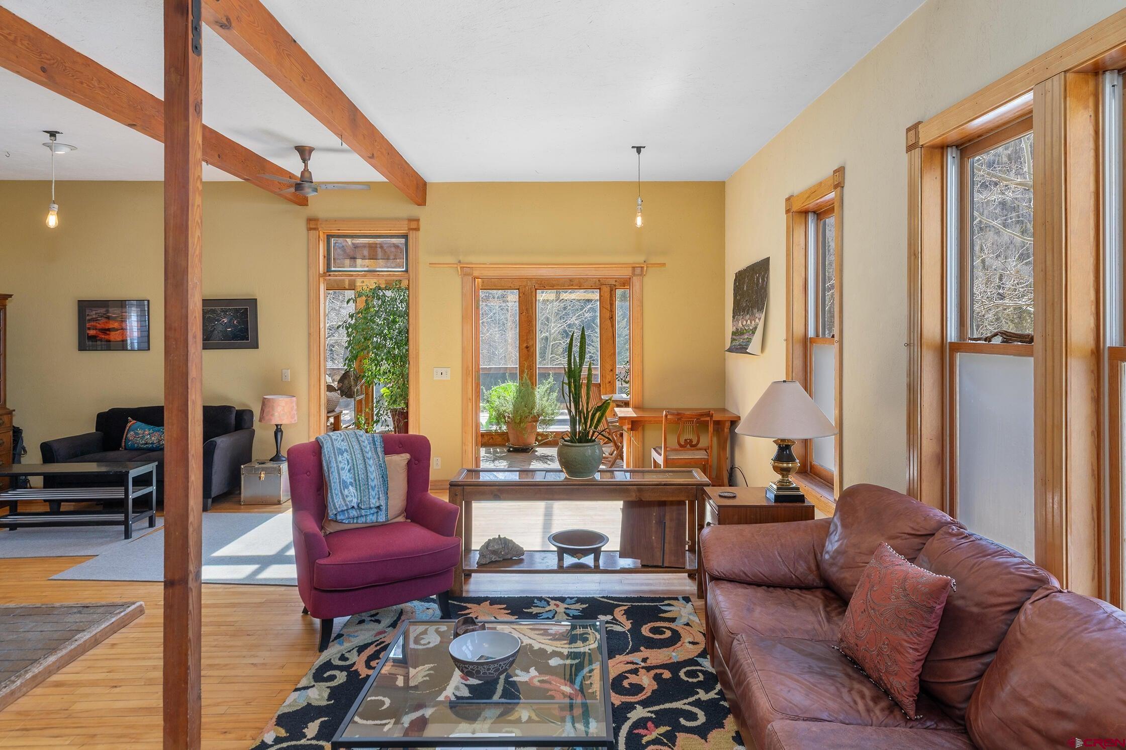 35 Porphyry Street Ophir, CO 81426 - Photo 4 of 40 a living room with furniture and a large window