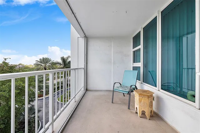 a view of a hallway with windows