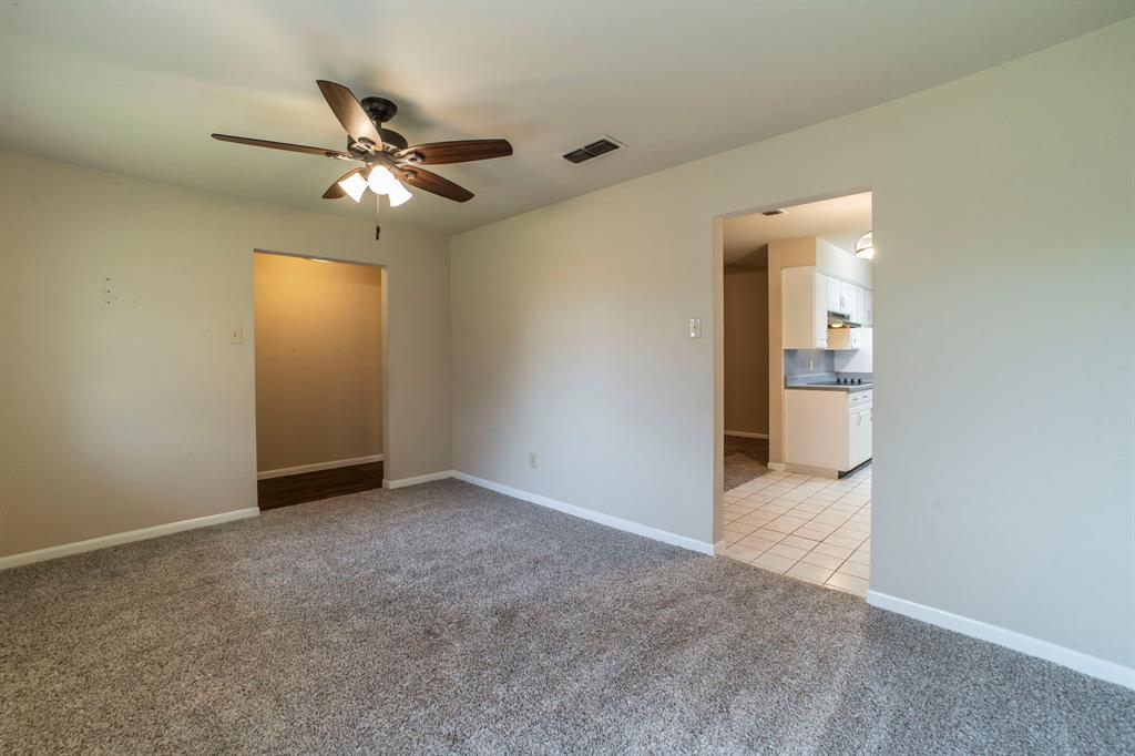 705 South 4th Street Midlothian, TX 76065 - Photo 7 of 15 a view of an empty room and window