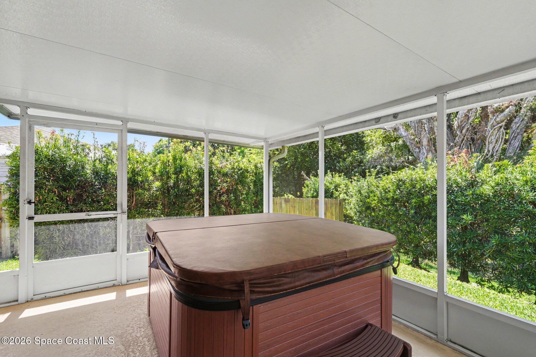 2604 Senator Way Melbourne, FL 32901 - Photo 23 of 27 a view of a room with a large window and dining area