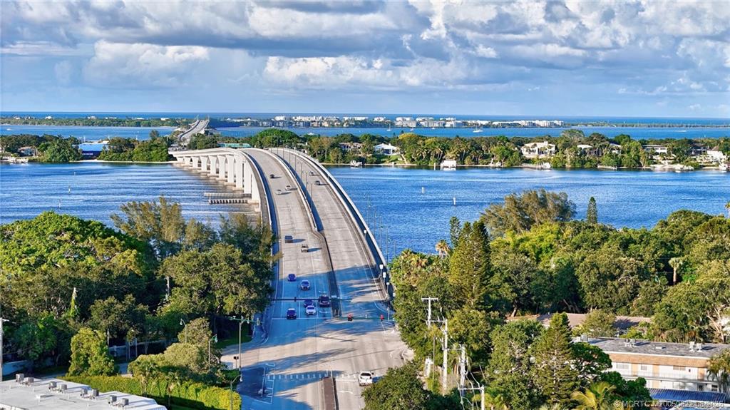 2950 Southeast Ocean Boulevard, Unit 556 Stuart, FL 34996 - Photo 2 of 33 a view of a yard in front of house