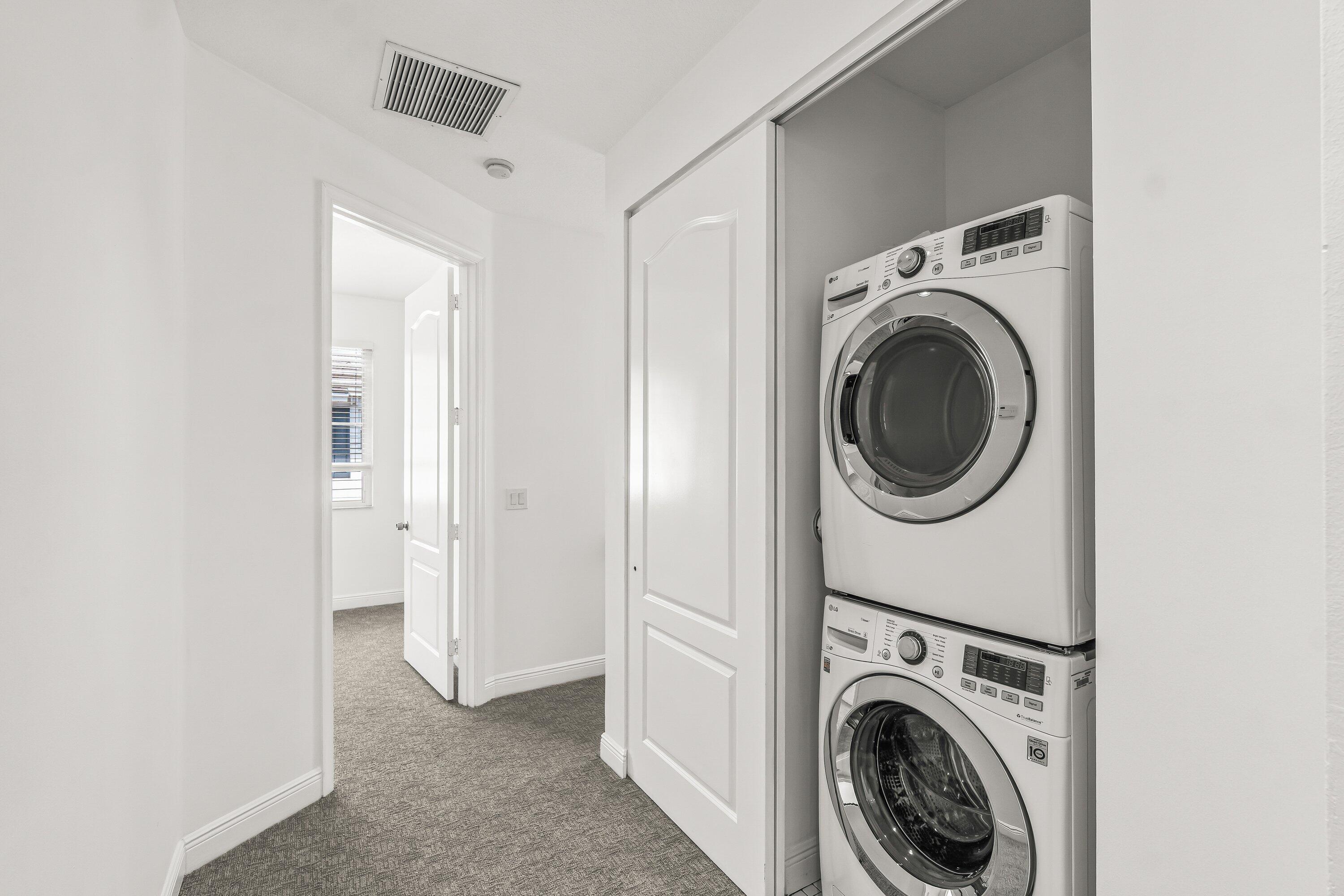 3830 Northwest 5th Terrace Boca Raton, FL 33431 - Photo 20 of 30 a view of a hallway with washer and dryer
