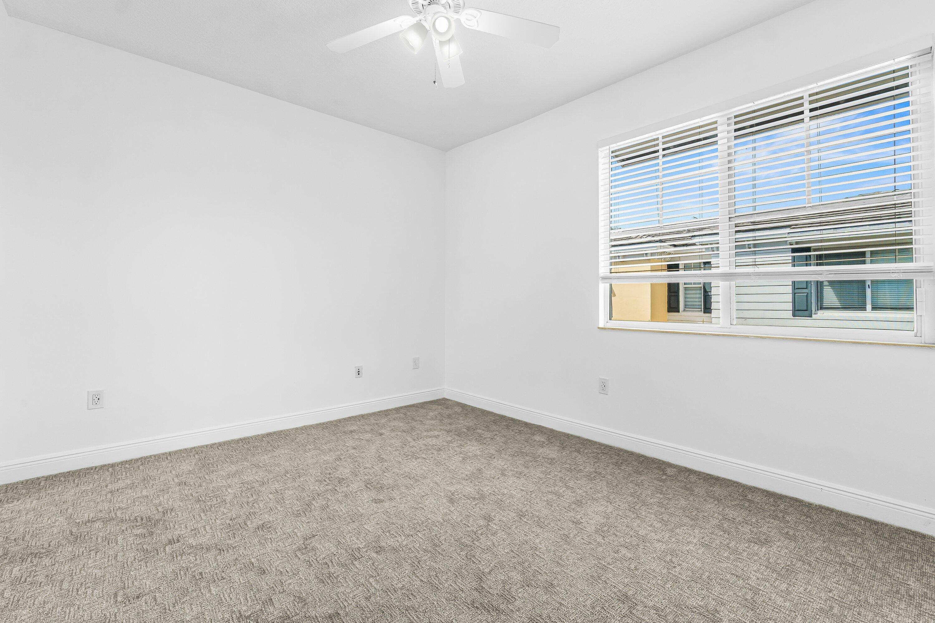 3830 Northwest 5th Terrace Boca Raton, FL 33431 - Photo 22 of 30 an empty room with a window