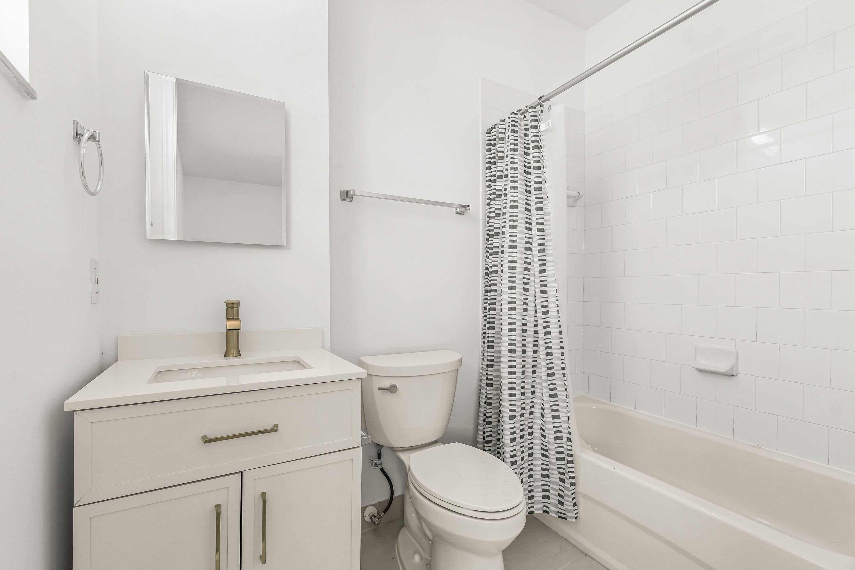 3830 Northwest 5th Terrace Boca Raton, FL 33431 - Photo 23 of 30 a bathroom with a sink toilet and shower