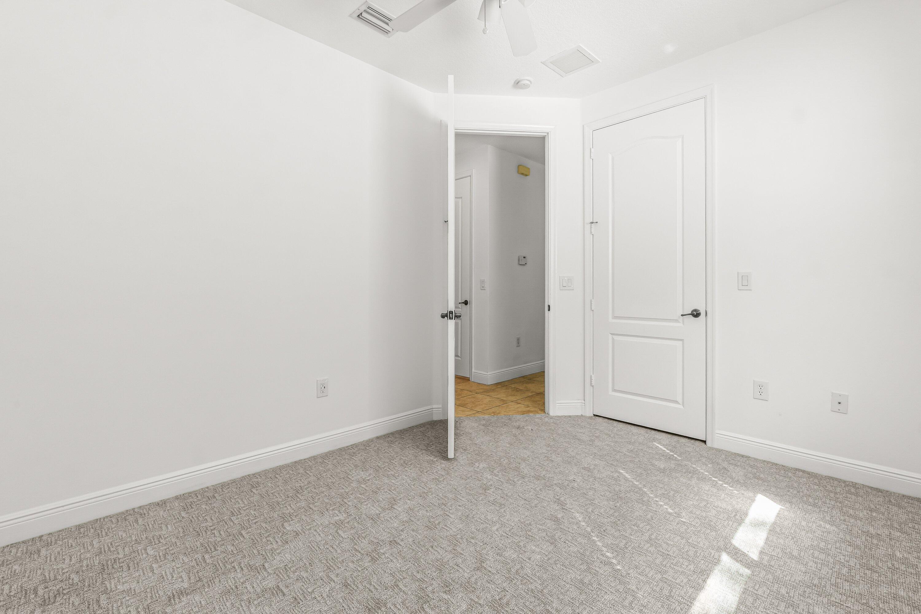 3830 Northwest 5th Terrace Boca Raton, FL 33431 - Photo 5 of 30 an empty room with an entryway