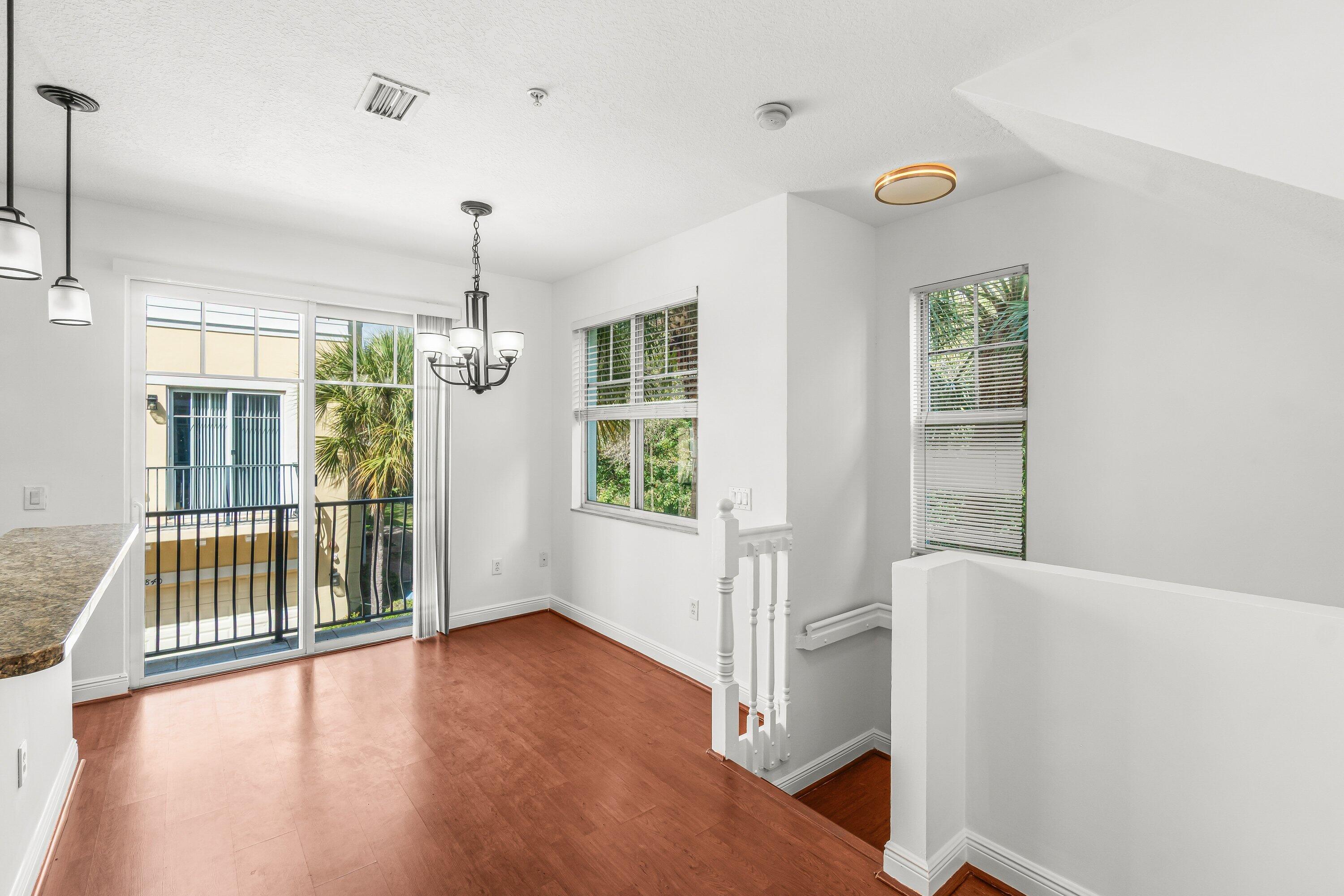 3830 Northwest 5th Terrace Boca Raton, FL 33431 - Photo 8 of 30 a view of entryway with wooden floor and window