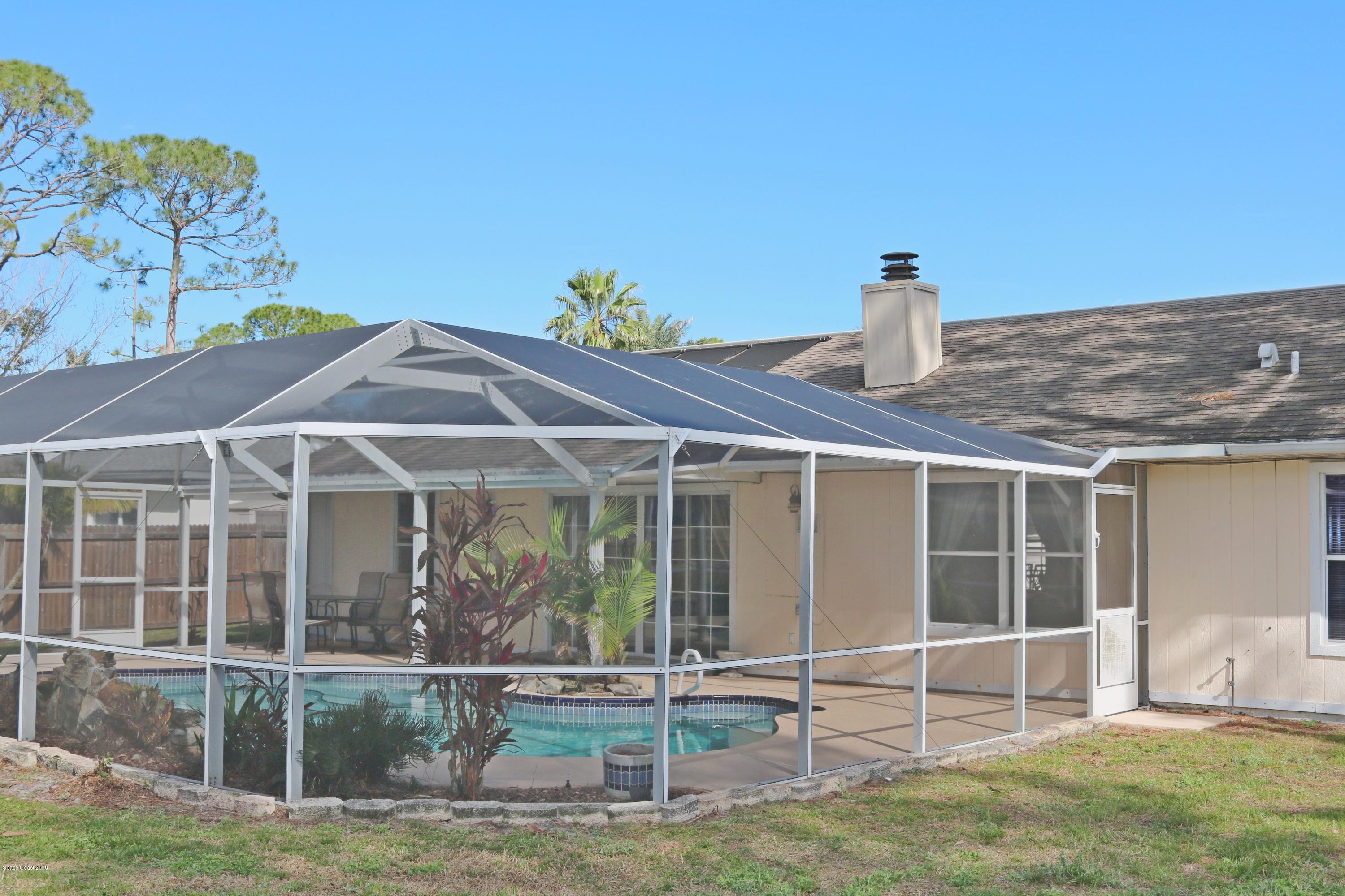 6154 Corning Road Cocoa, FL 32927 - Photo 15 of 16 a house view with a garden space
