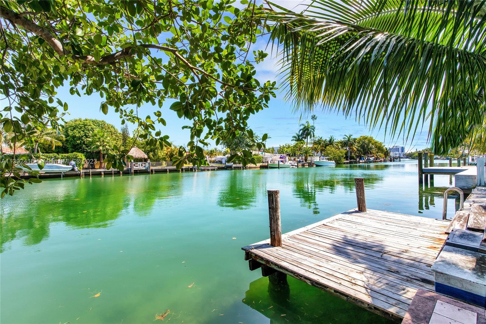 1541 Calais Drive Miami Beach, FL 33141 - Photo 22 of 33 a view of a lake with houses next to a lake