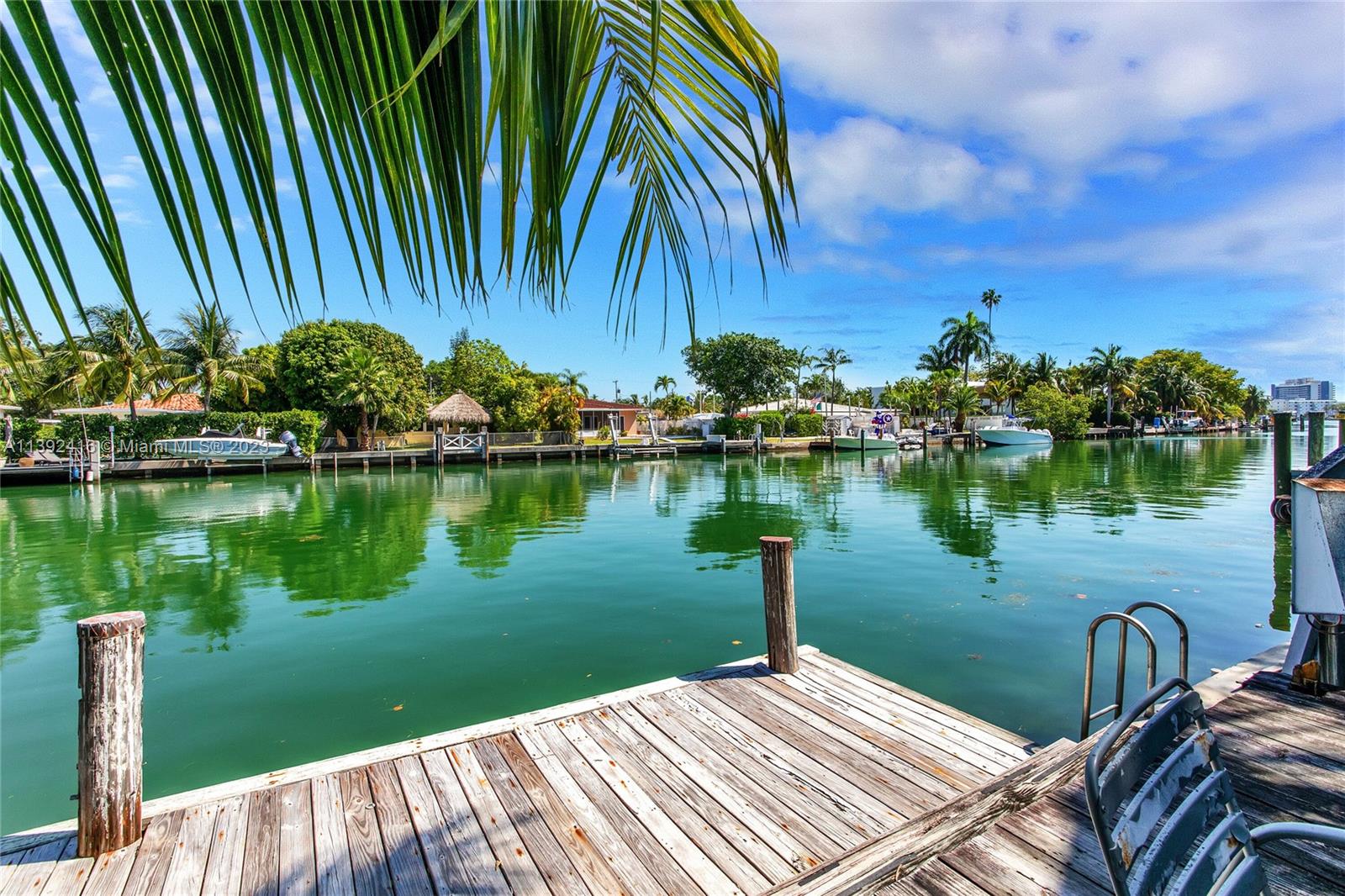 1541 Calais Drive Miami Beach, FL 33141 - Photo 23 of 33 a view of a lake with a yard and potted plants