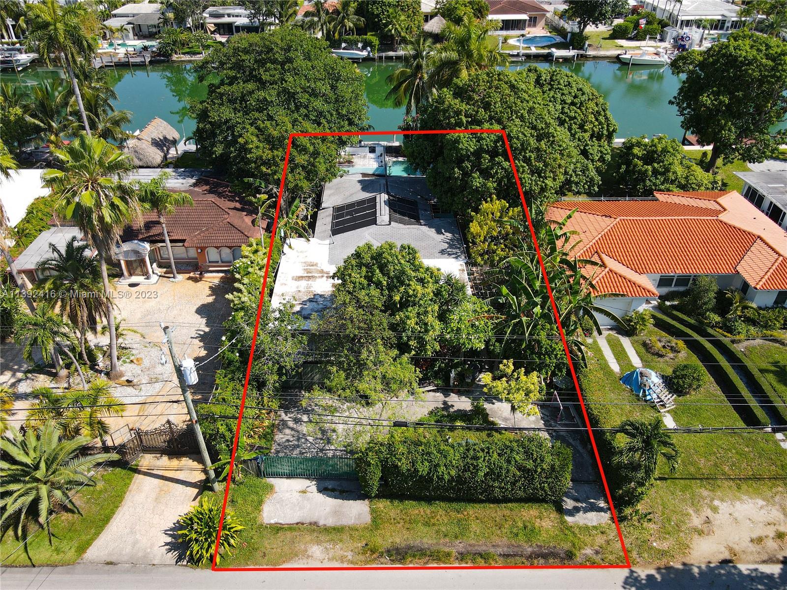 1541 Calais Drive Miami Beach, FL 33141 - Photo 26 of 33 a view of a yard with plants