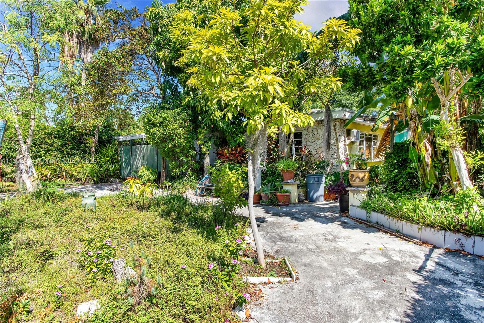 1541 Calais Drive Miami Beach, FL 33141 - Photo 31 of 33 a pathway of a yard