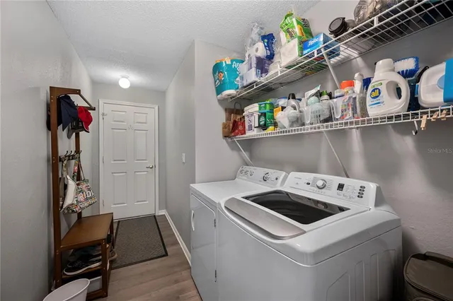 a utility room with dryer and washer