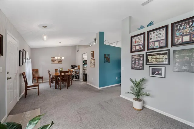 a view of a livingroom with furniture and window
