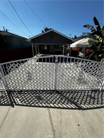 a black and white photo of a glass door