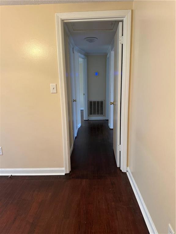 615 Cassville Road Southeast, Unit A Cartersville, GA 30120 - Photo 14 of 21 a view of a hallway with wooden floor and a closet