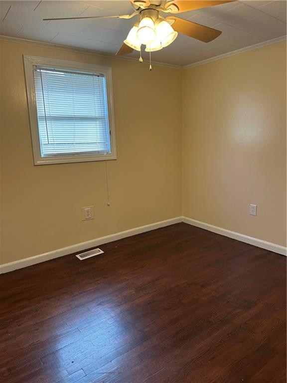 615 Cassville Road Southeast, Unit A Cartersville, GA 30120 - Photo 17 of 21 a view of an empty room with wooden floor and a window