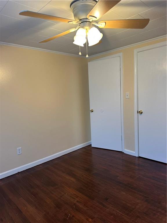 615 Cassville Road Southeast, Unit A Cartersville, GA 30120 - Photo 20 of 21 a view of a small space with wooden floor and a chandelier fan