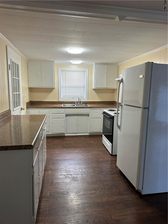 615 Cassville Road Southeast, Unit A Cartersville, GA 30120 - Photo 6 of 21 a kitchen with granite countertop stainless steel appliances a refrigerator a sink a stove top oven and cabinets