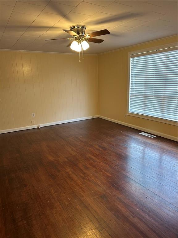 615 Cassville Road Southeast, Unit A Cartersville, GA 30120 - Photo 8 of 21 a view of an empty room with wooden floor and a window