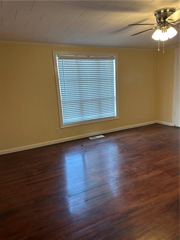 615 Cassville Road Southeast, Unit A Cartersville, GA 30120 - Photo 10 of 21 a view of an empty room with wooden floor and a window