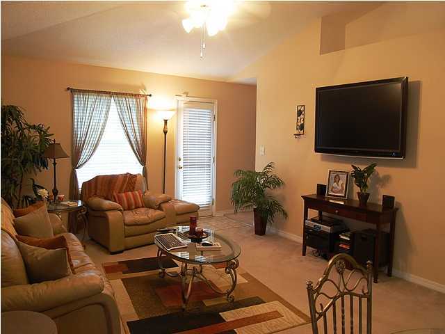 105 Bayou Landing Road Miramar Beach, FL 32550 - Photo 4 of 15 a living room with furniture and a flat screen tv