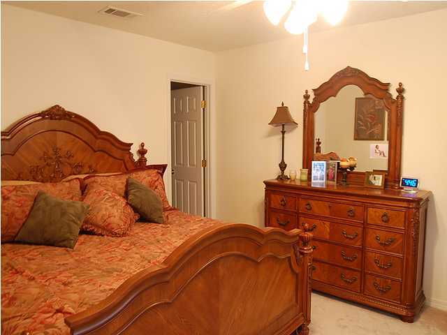 105 Bayou Landing Road Miramar Beach, FL 32550 - Photo 8 of 15 a bedroom with a bed and a night stand