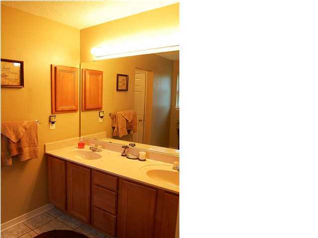 105 Bayou Landing Road Miramar Beach, FL 32550 - Photo 10 of 15 a bathroom with a sink and a mirror