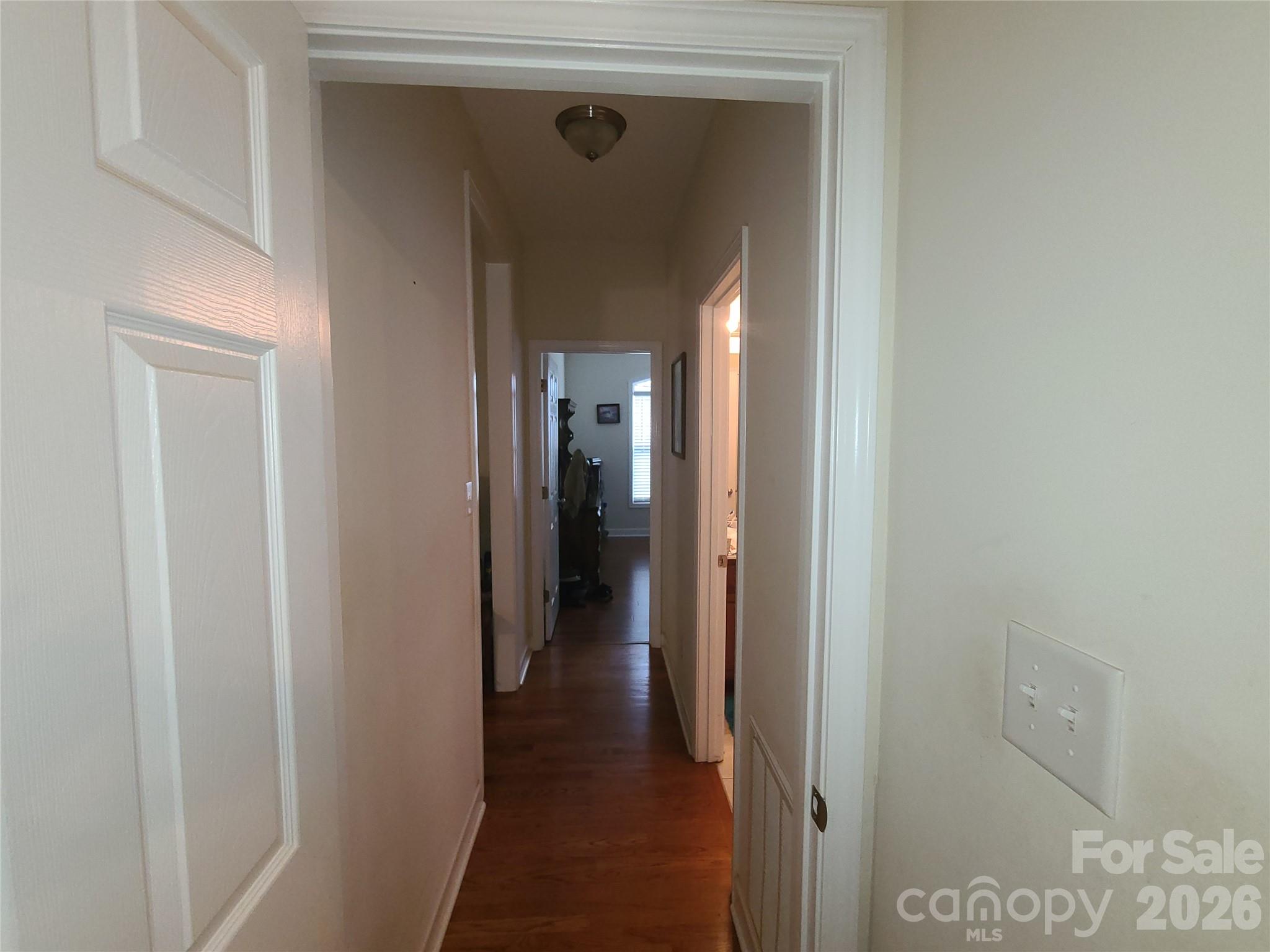 1638 Bess Town Road Bessemer City, NC 28016 - Photo 17 of 31 a view of a hallway with wooden floor