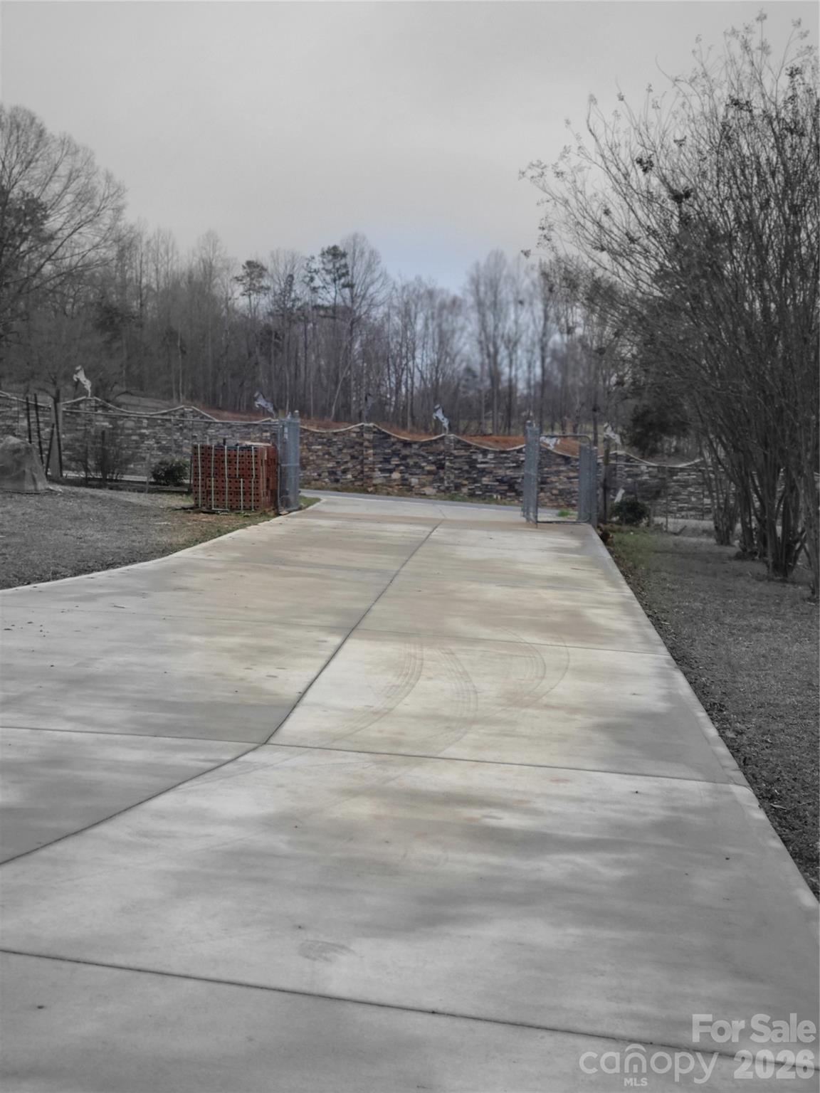 1638 Bess Town Road Bessemer City, NC 28016 - Photo 25 of 31 a view of pathway with a wrought fence