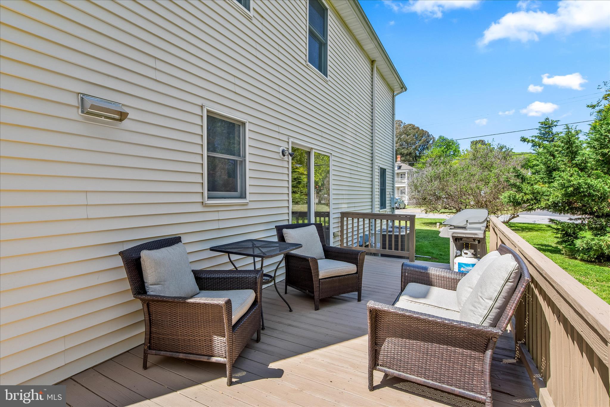 21406 Dogwood Cove Road Tilghman, MD 21671 - Photo 7 of 68 a view of a patio with a couple of chairs