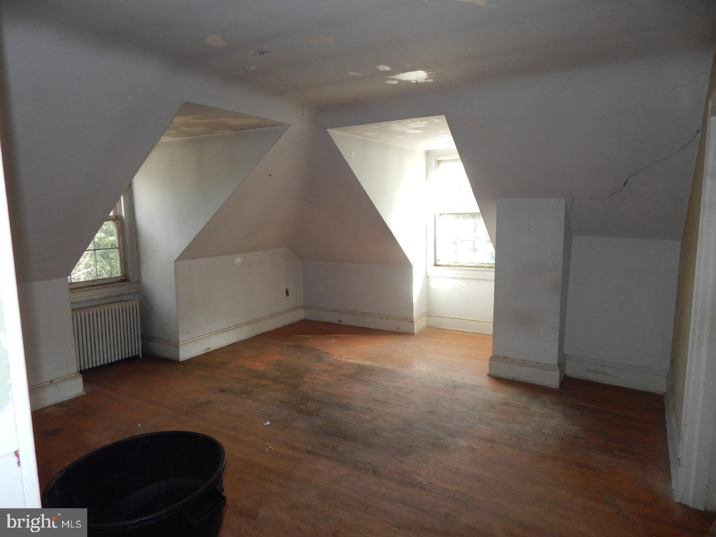 605 Upland Road Pikesville, MD 21208 - Photo 13 of 38 a view of a livingroom with a staircase